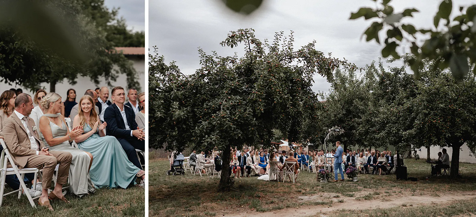 Freie Trauung im Obstgarten: Gäste sitzen unter Bäumen, während das Paar seine Zeremonie am Spessarthof in Aura im Sinngrund feiert.